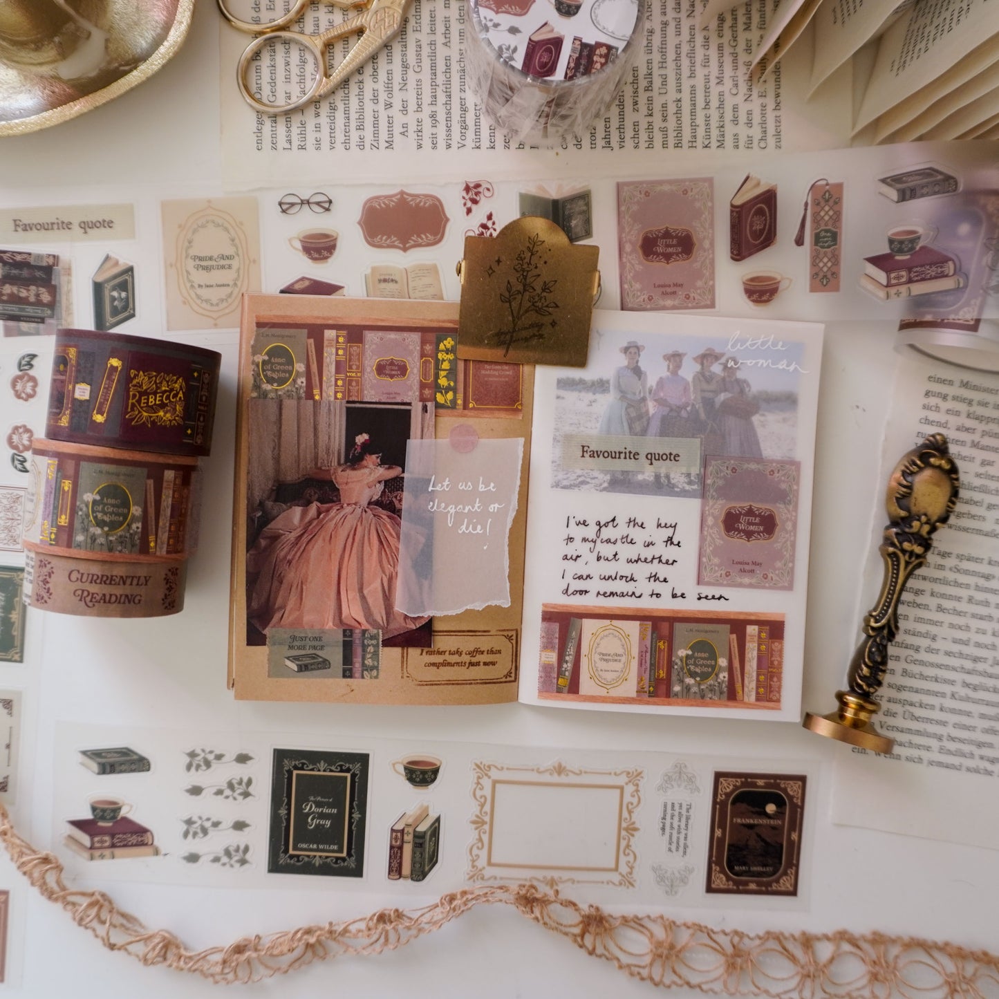 A little woman book journal page decorated with book-themed washi tape and stickers in a light academia romantic aesthetic