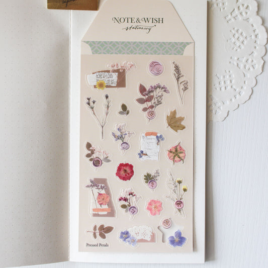 Pressed Petals vintage botanical PVC sticker sheet featuring camellias delphiniums and floral wax seals in purples and pinks