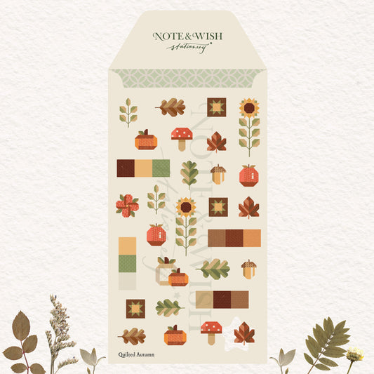autumn-themed stickers displayed on a textured off-white background with decorative botanical elements at the bottom corners. The sheet features illustrations of pumpkins, acorns, mushrooms, leaves, sunflowers, and color blocks in warm autumn tones.