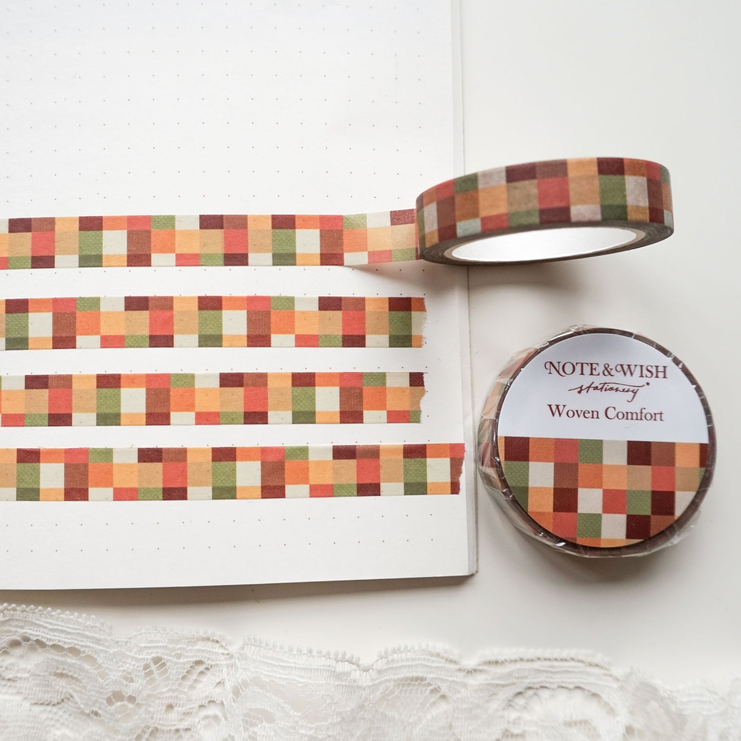 autumn check washi tape features a cosy woven check pattern in deep reds, browns, oranges, and greens.