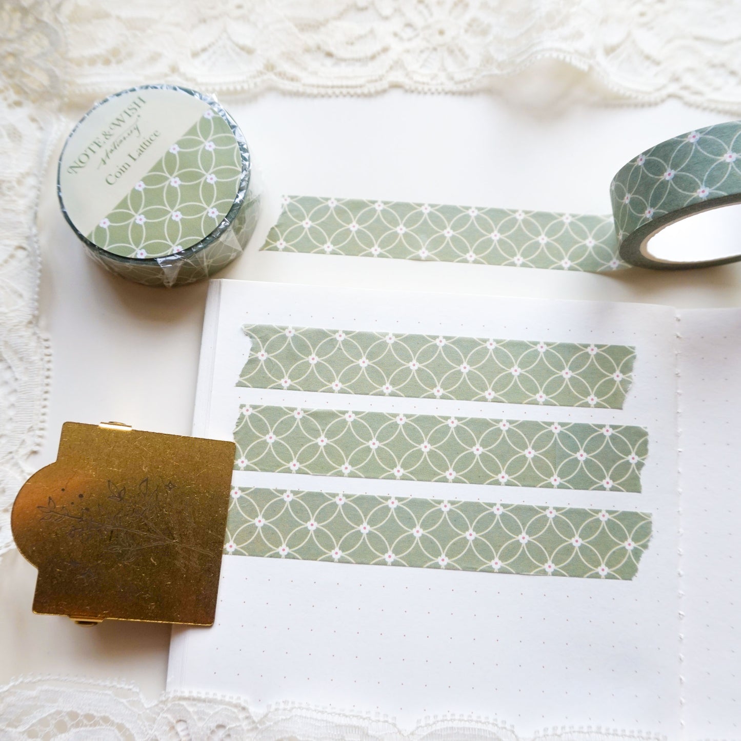 a washi tape with coin lattice pattern in light green.