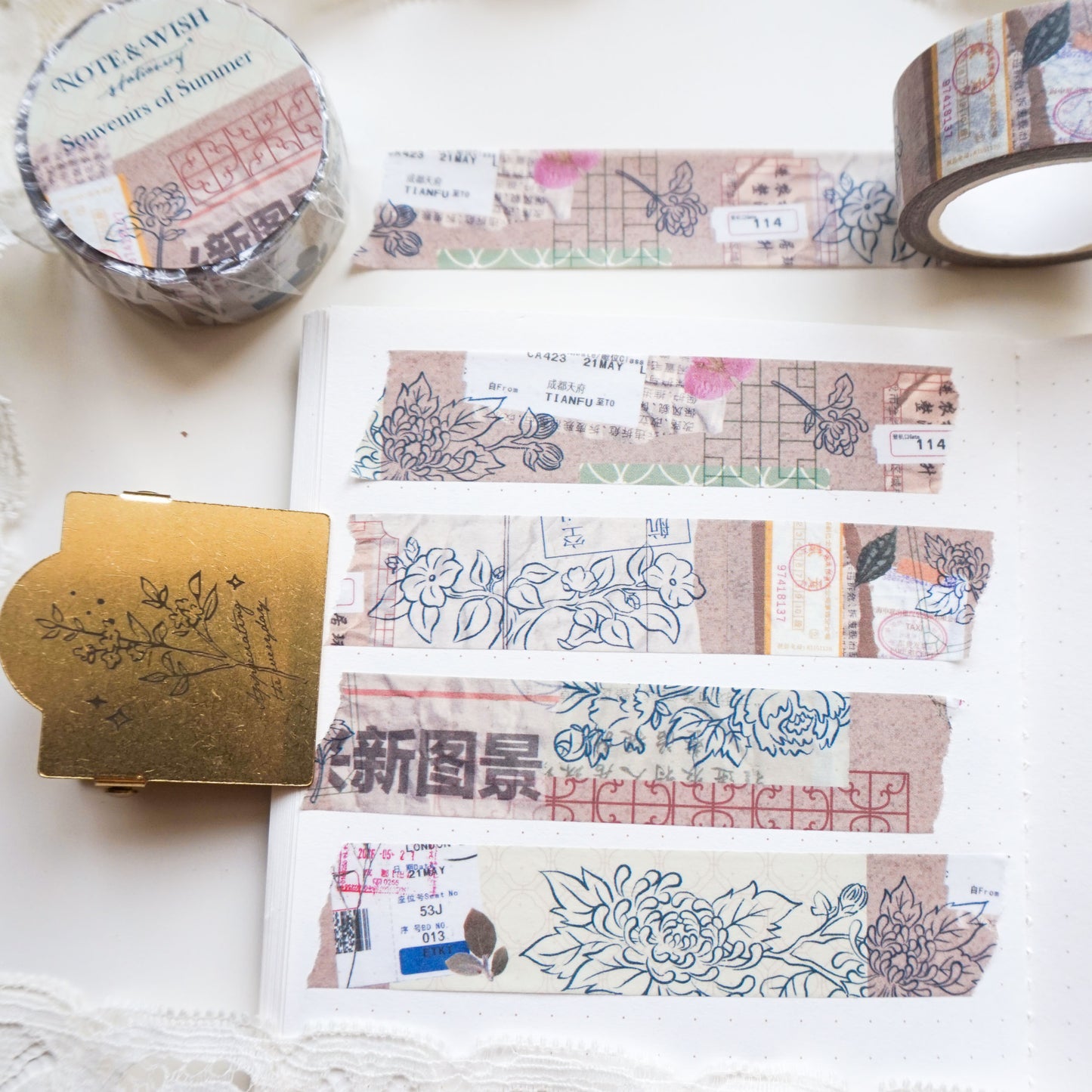 This collage style washi tape features ephemera and drawings of chrysanthemum flowers