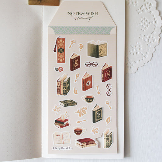 Hand drawn vintage book and delicate teacup illustrations on dark academia washi sticker sheet