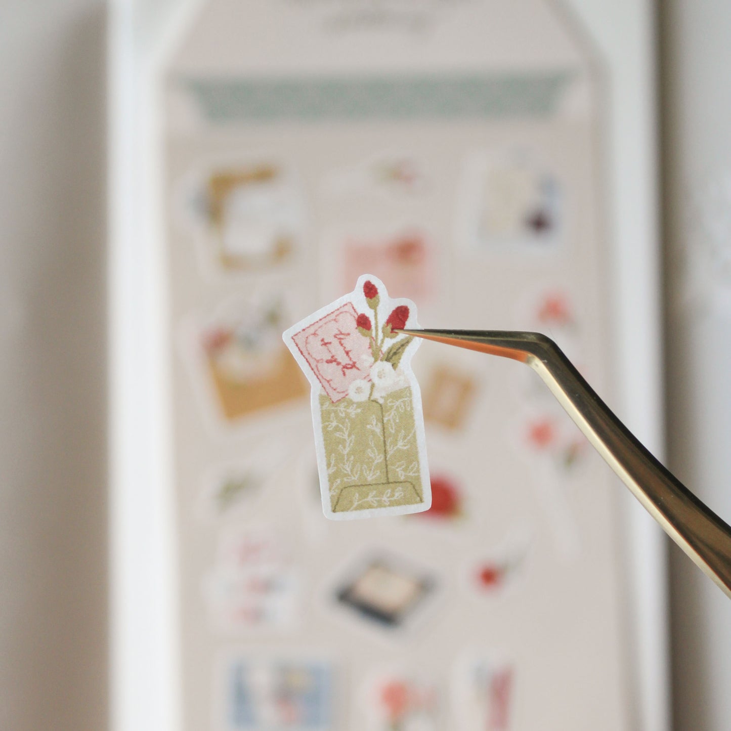 close up of sticker illustration of a floral envelope with flowers