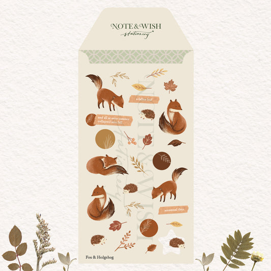 sticker sheet with cosy woodland drawings of some foxes and hedgehogs with autumn leaves
