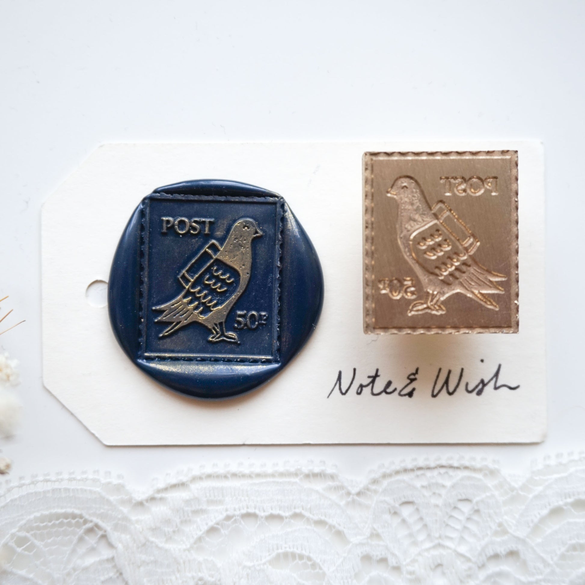 wax seal stamp with a drawing of a pigeon
