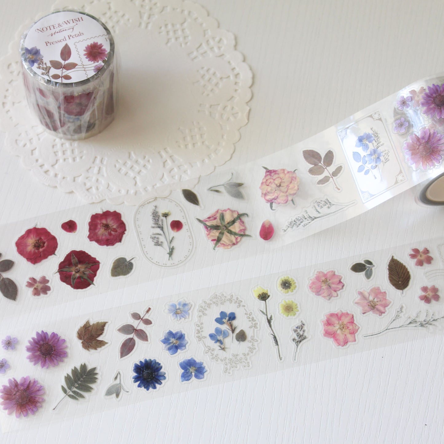 Pre-cut pressed flower PET tape featuring camellias, delphiniums &amp; plum blossoms.