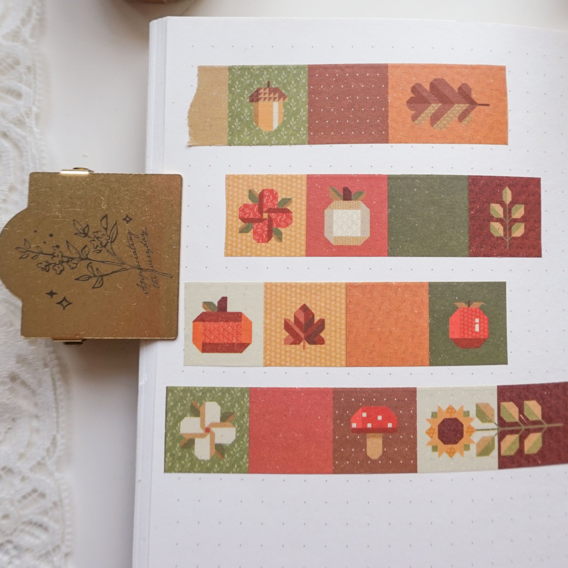 quilted autumn washi tape with illustrations of acorns, flowers, leaves, mushrooms and sunflowers