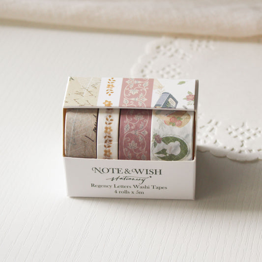 Set of regency jane austen themed washi tapes in a decorative box on a textured surface