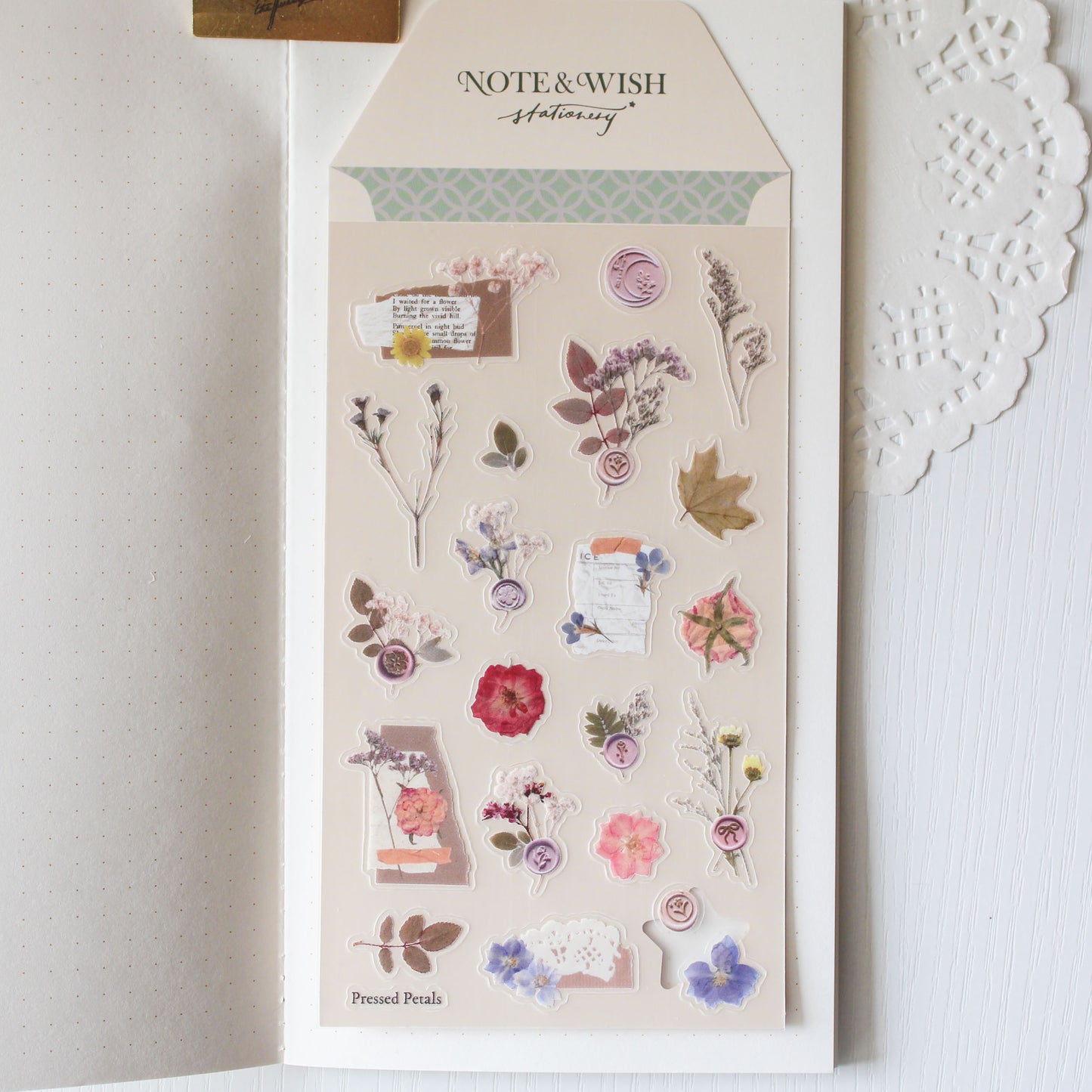 Pressed Petals vintage botanical PVC sticker sheet featuring camellias delphiniums and floral wax seals in purples and pinks
